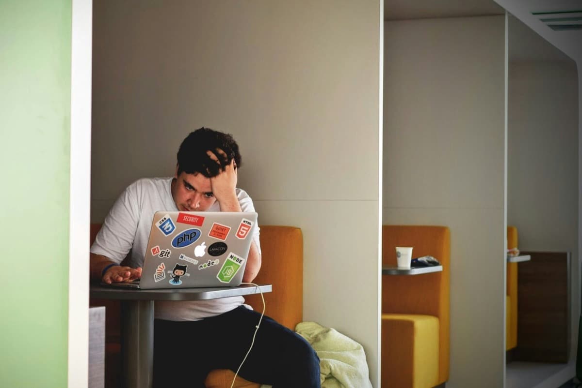 A student pausing calmly between GCSE revision sessions